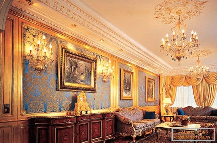 Living room in the house of a large French family. The Empire style in the guest room demonstrates the status of the owners of the house. Royal, expensive apartments are interesting with the right combination of details. Fretwork on the walls, lamps, chandelier and golden-colored lambrequins harmoniously look in the overall picture of the interior. 