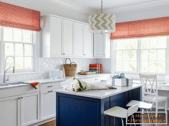 Red curtains on the kitchen in a rustic style