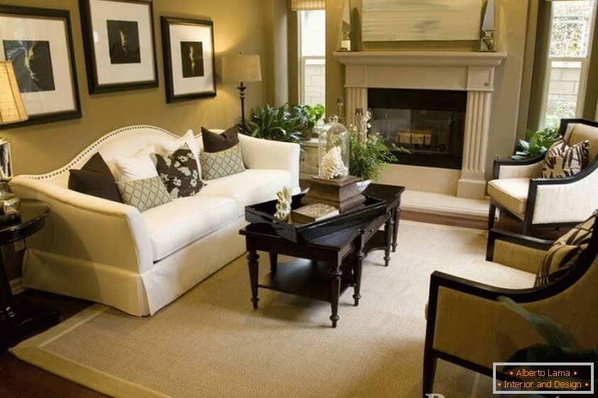 Sofa, table and armchairs by the fireplace