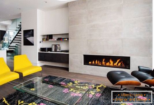 Modern living room in bright colors and with a fireplace