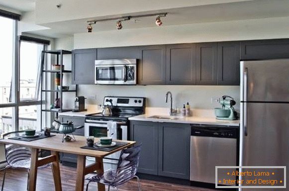 A spacious kitchen in the style of a shaker