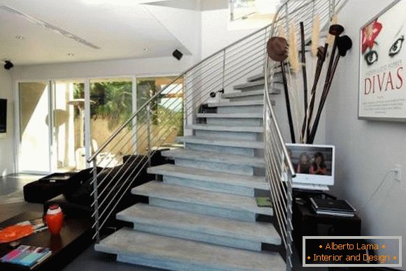 Beautiful concrete staircase in the interior of a private house