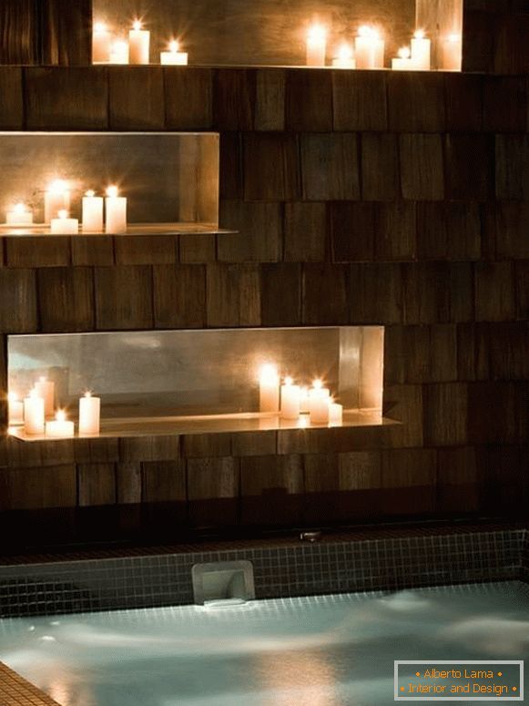 Niches with candles in the bathroom