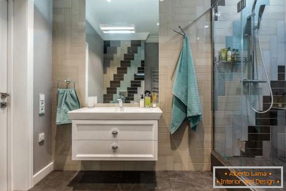 Beautiful bathroom design with unusually laid tiles