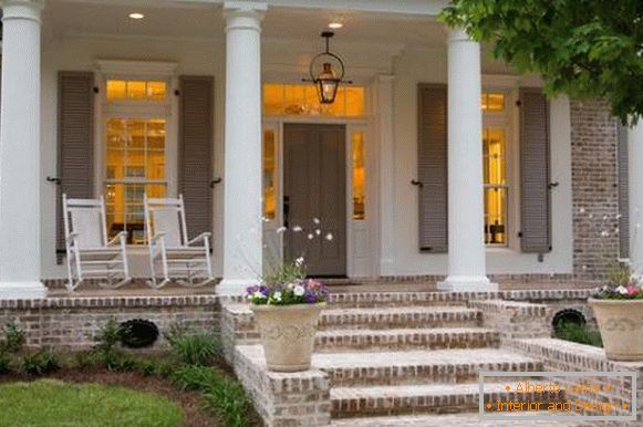 Porch in a private house - a photo with columns and a canopy