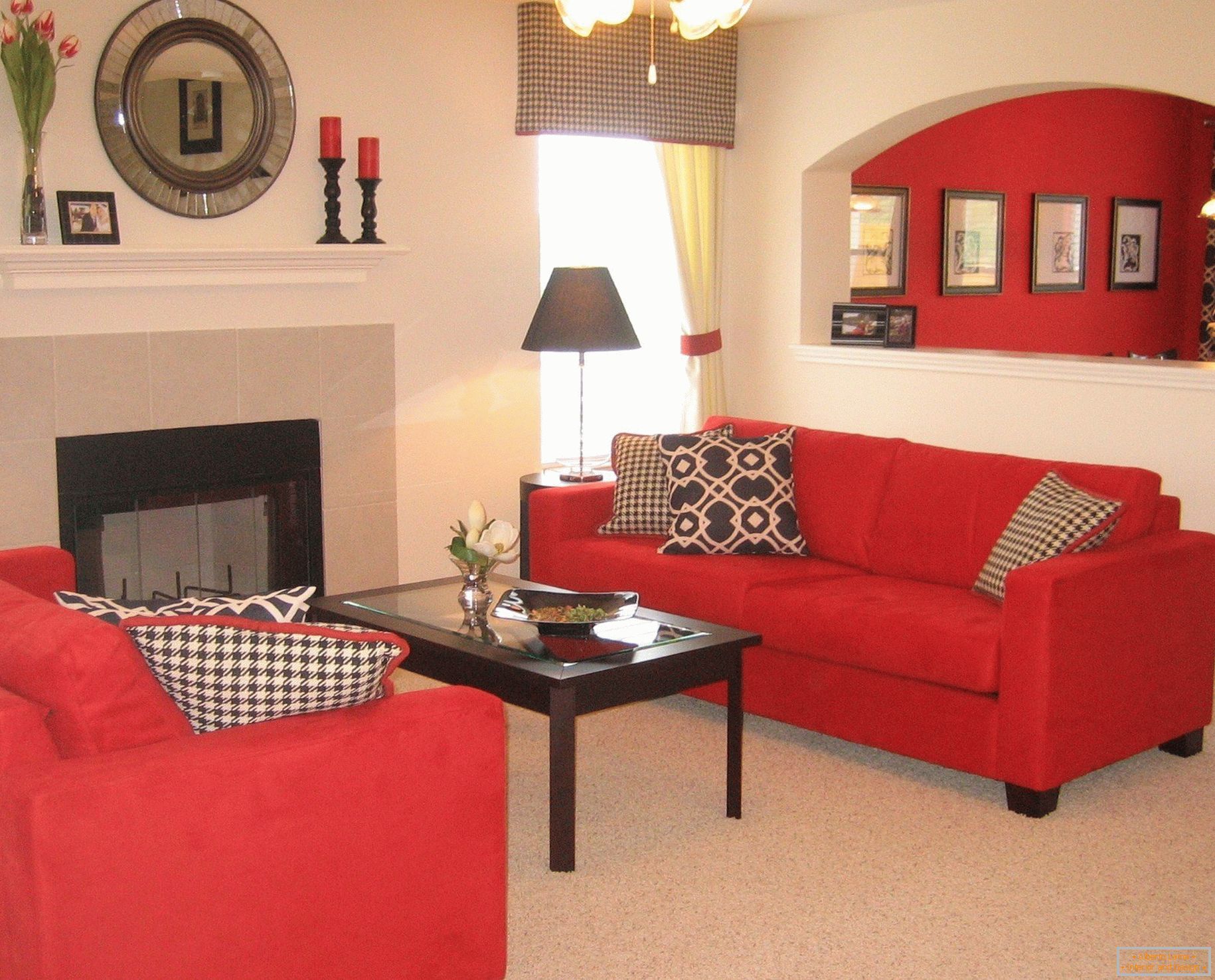 Sofas and a table near the fireplace