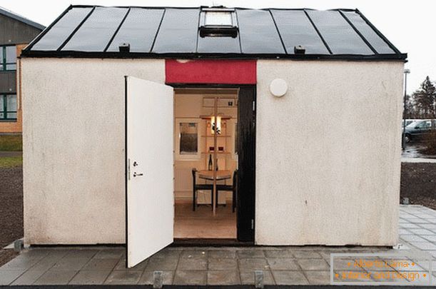 Entrance door to a small house