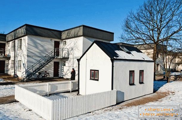 Small house with a fence