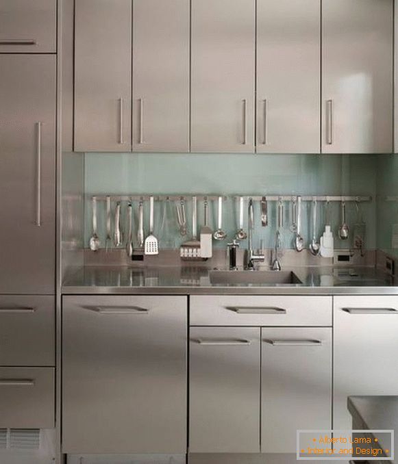 A set of kitchen utensils on the rails in the interior