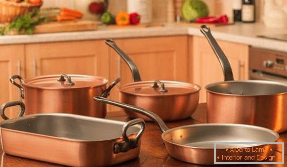 A set of kitchen utensils made of copper in the interior