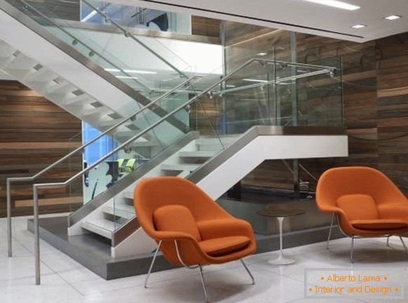 Orange chairs Saarinen Womb