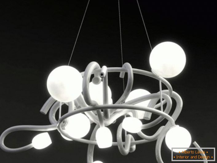 A ceiling chandelier made of metal gives maximum illumination for a small room. With the help of fantasy, this type of lighting can be combined with additional elements.