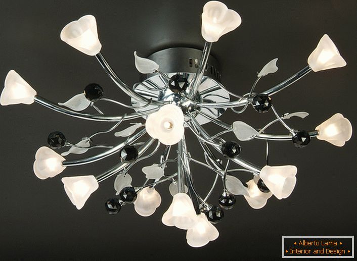 Flower motifs in the design of ceiling chandeliers. The high-tech style is closely monitored, the chrome-plated metal is elegantly combined with frosted white glass.
