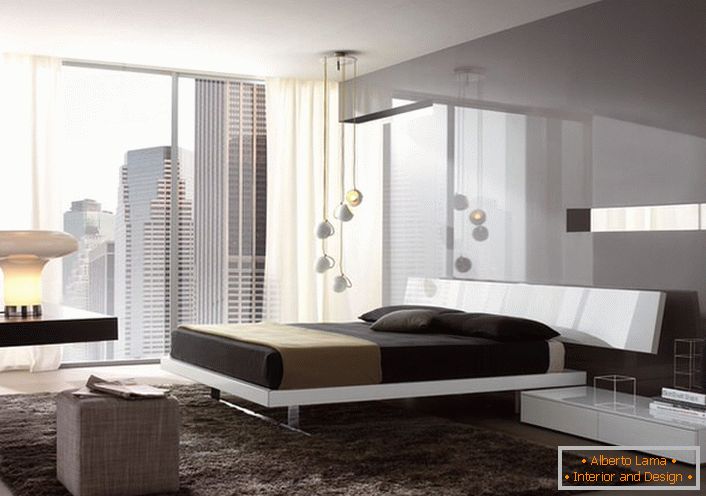 High-tech style often uses low chandeliers. Five chandeliers with laconic shades on different levels hang over the bed.