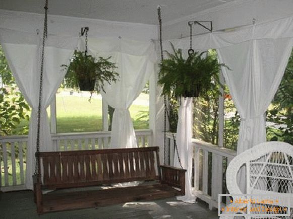 Decorative decorations in a summer kitchen with a veranda, photo 2