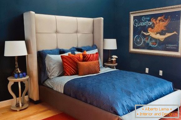 Luxurious dark blue color of wallpaper in the bedroom