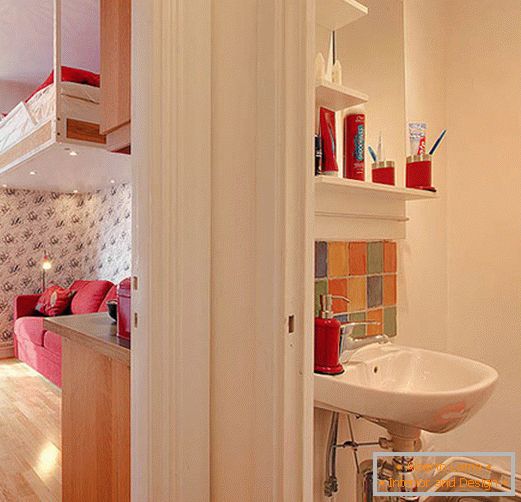 Bathroom interior with red accents