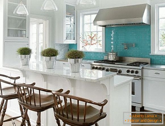 Turquoise kitchen panel made of brick mosaic