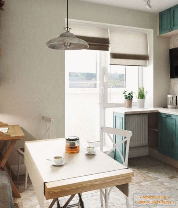 Kitchen design with balcony in a small studio apartment - photo
