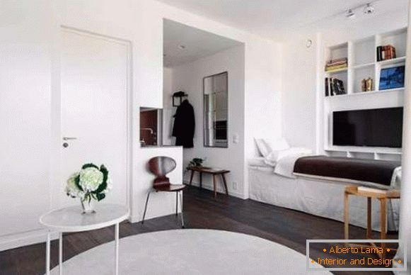 Small studio apartments - design bedroom bedroom in the photo