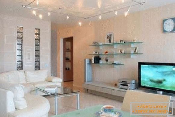 Design of a small studio apartment of 30 sq. M in high-tech style - photo of the living room