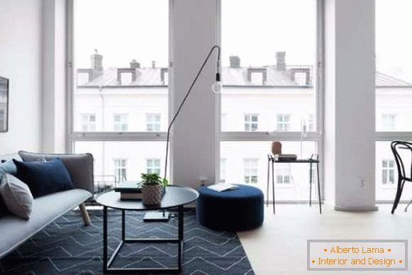 Small apartment studio - interior design of the living room in the photo