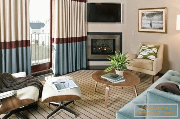 How to visually make the room wider - striped curtains in the interior