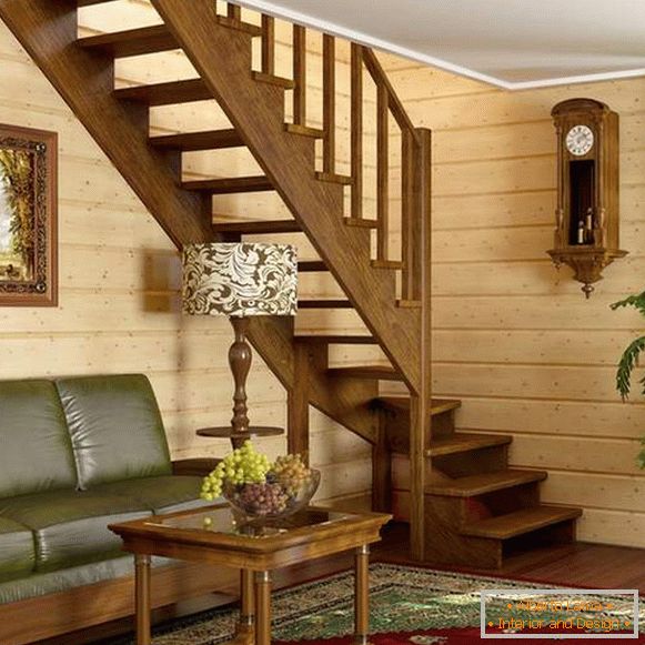 Intermediate wooden stairs in a private house - photo design in a modern style