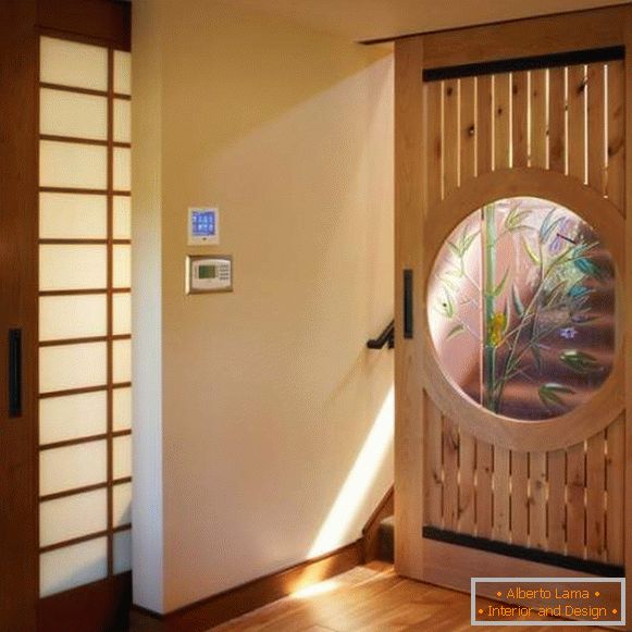 Sliding interior doors of wood with glass inserts