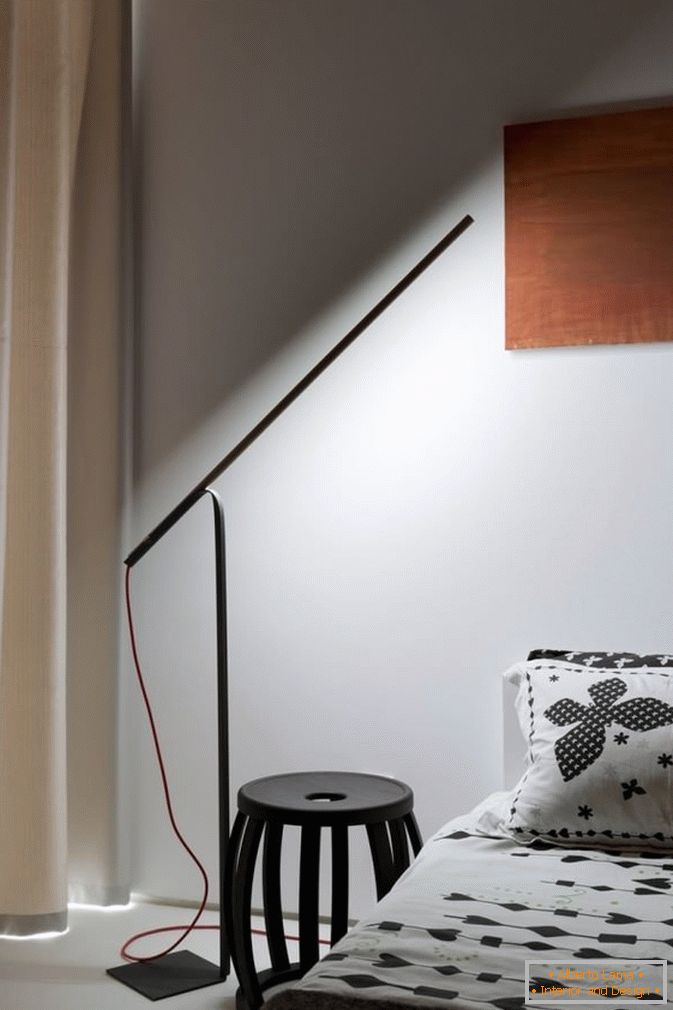 Lighting in the bedroom of a small one-bedroom apartment in Kiev