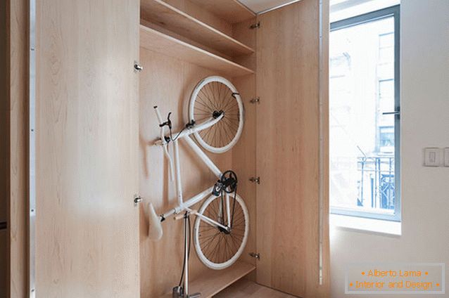 Bike in the closet in the multifunctional apartment-transformer