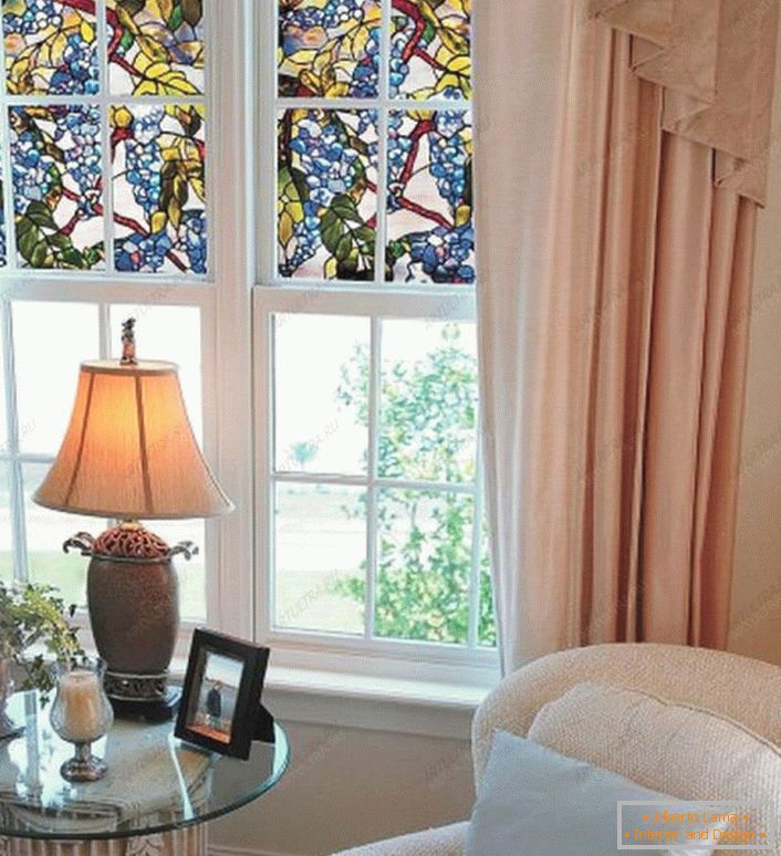 Stained glass films are glued on the half of the window. A great way to protect yourself from excessive sunlight. 