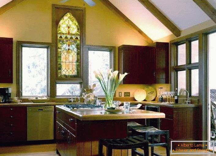 Stained glass in the kitchen in the country style becomes a protection against excess sunlight. 