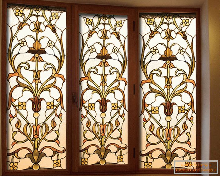 Stained-glass film with a gold pattern - a stylish decoration for the interiors of country cottages.