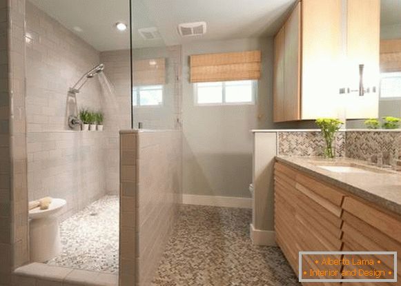 Shower without a tray with a wall and a glass partition