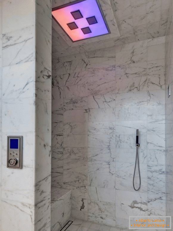 Functional shower with marble tiles