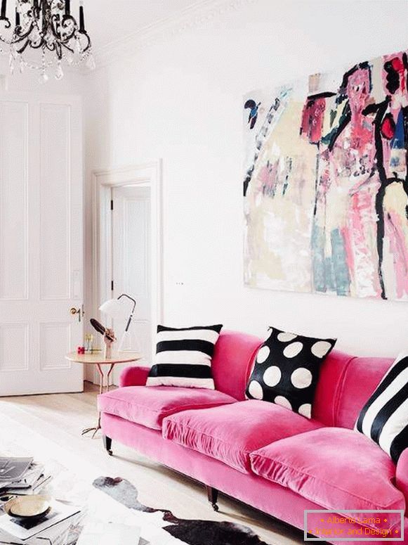 Pink sofa in the interior of the living room Photo