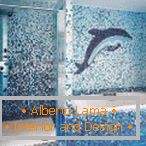 Dolphin of mosaic on bathroom wall