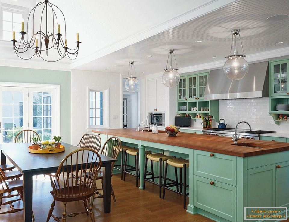 Kitchen interior with a combination of mint shade, wood, glass and metal