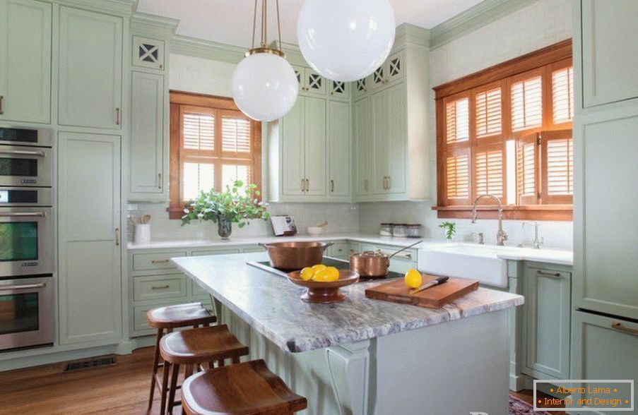 Winning combination of mint and wood in the interior of the kitchen