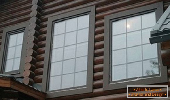 Beautiful trim for windows in a wooden house, photo 10