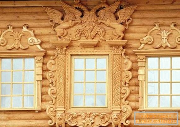 Beautiful platbands for windows in a wooden house, photo 5