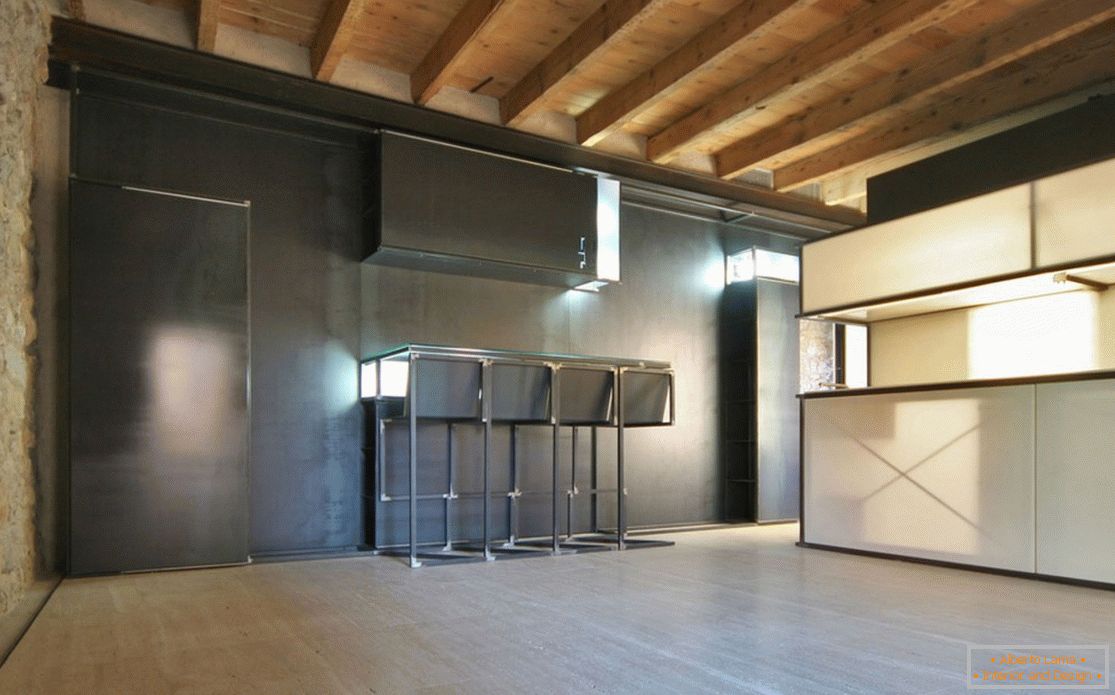 A beautiful combination of white and black kitchen headset at home in Brescia