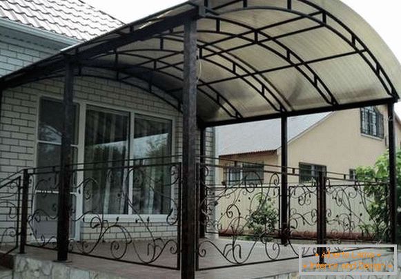 prefabricated polycarbonate awning in the courtyard of a private house, photo 11