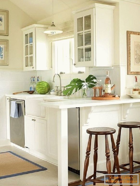 White kitchen with breakfast bar