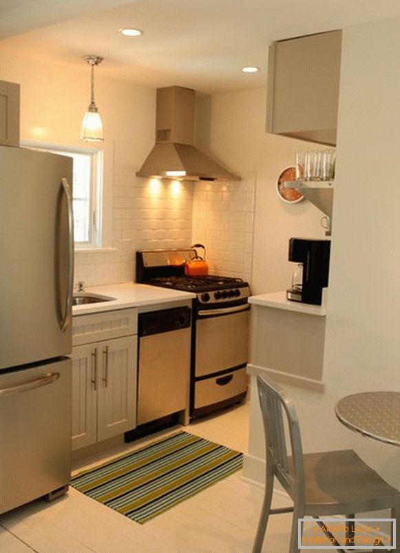 Large refrigerator in a small kitchen