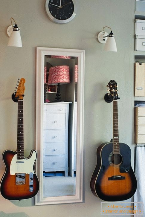 Vertical mirror and two stunning guitars