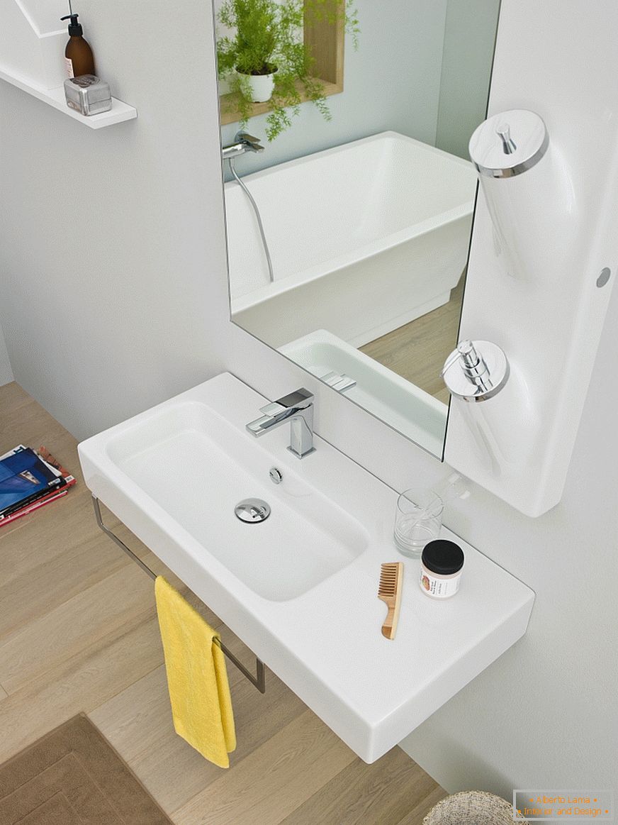 Washbasin with shelf in the interior of a small bathroom