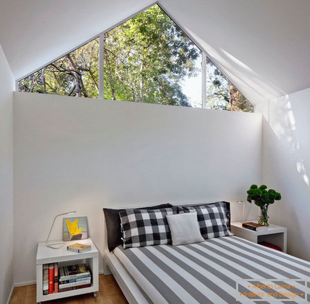 Triangular window in the bedroom