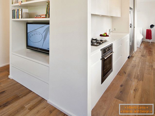 Wooden floor in a rectangular studio apartment